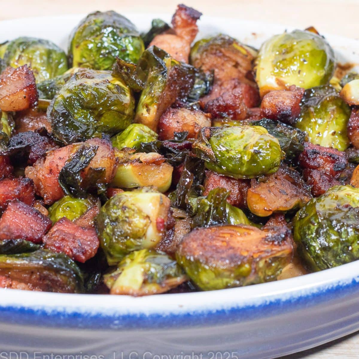 Roasted Brussels with Pancetta in a baking dish.