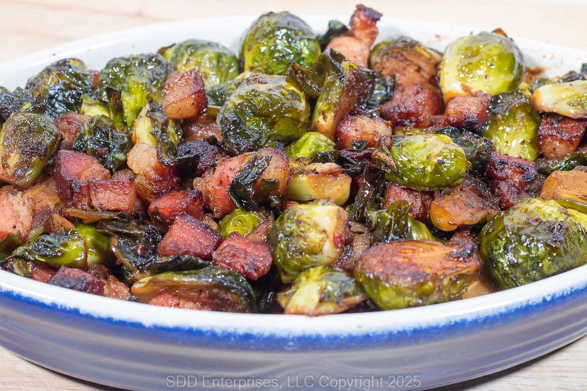 Roasted Brussels Sprout with Pancetta in a baking dish.
