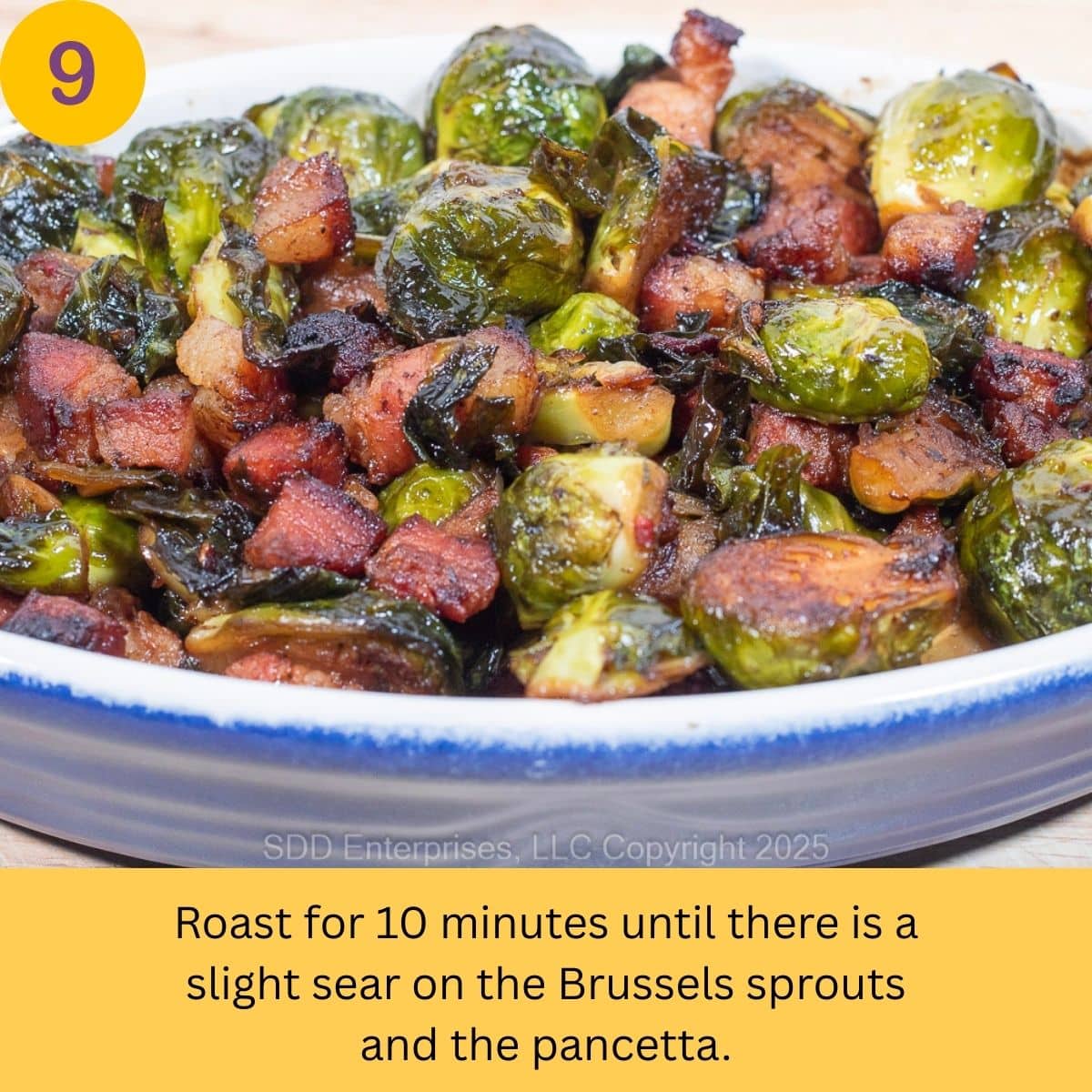 Roasted Brussels Sprouts with Pancetta in a baking dish right out of the oven.