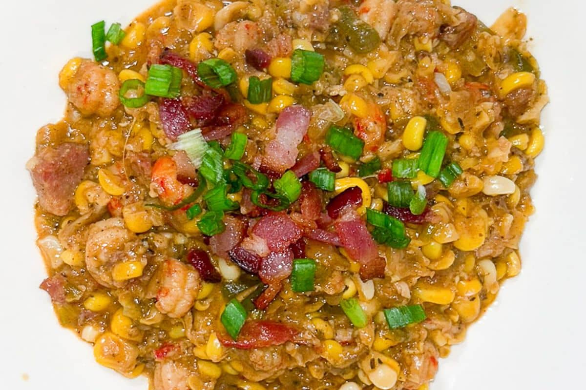 Crawfish Maque Choux in a white bowl.