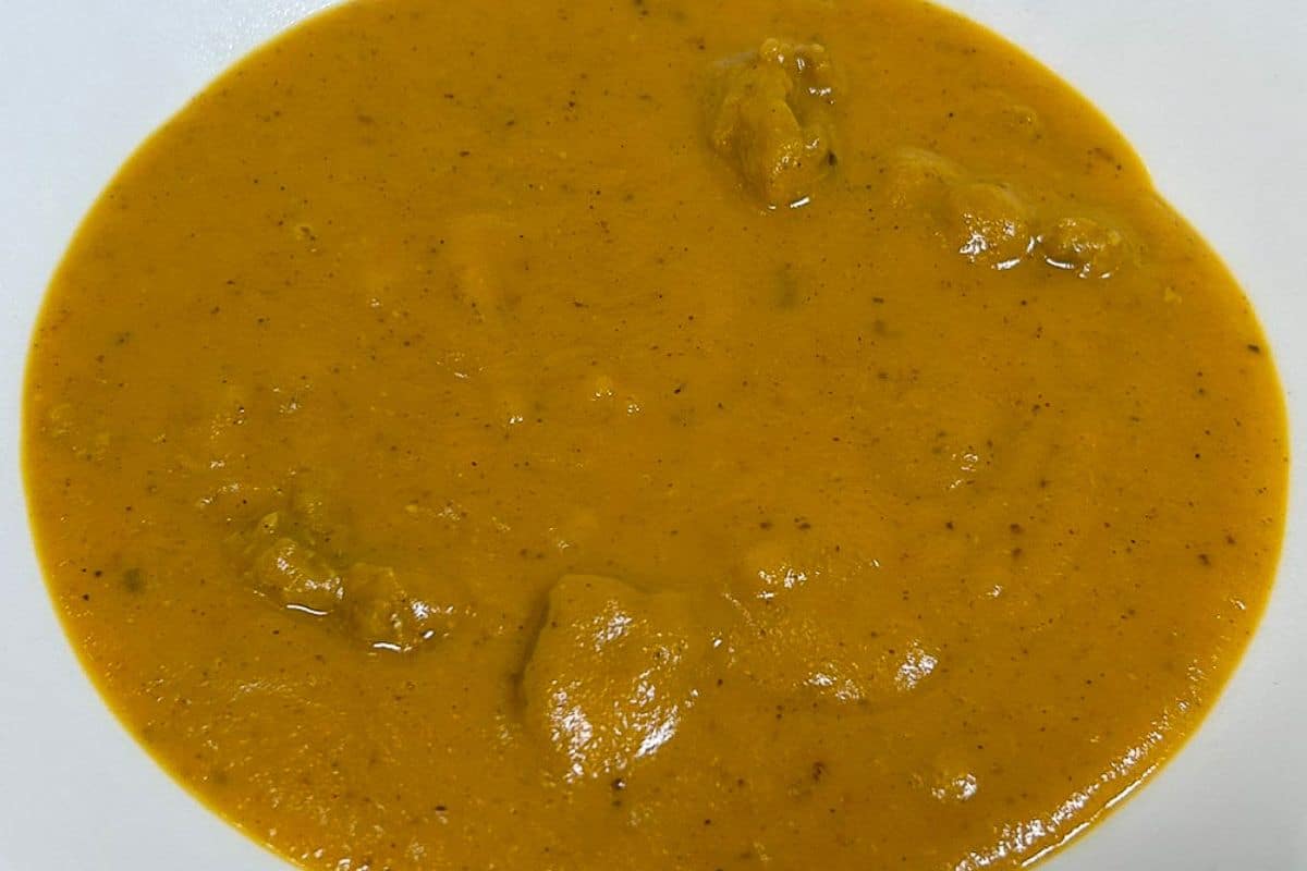 Sweet Potato Bisque in a white bowl.