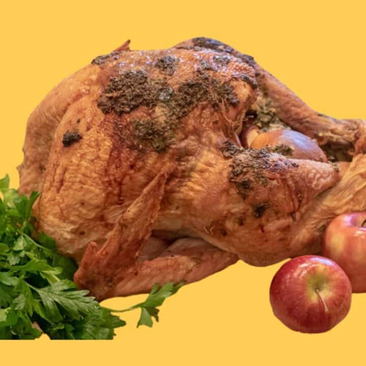 Herb Roasted Turkey with parsley and fresh fruit.