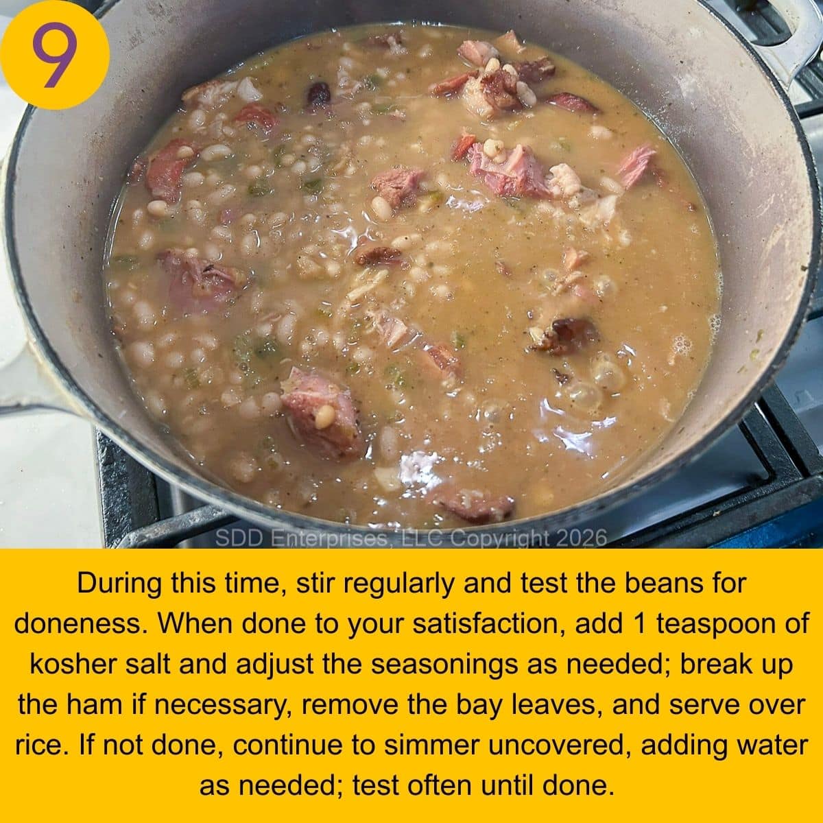 White Beans and Ham finishing a simmer in a Dutch oven.