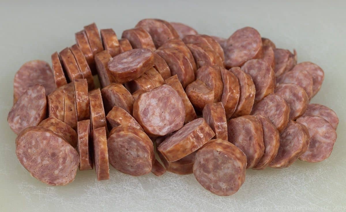Sliced smoked sausage.
