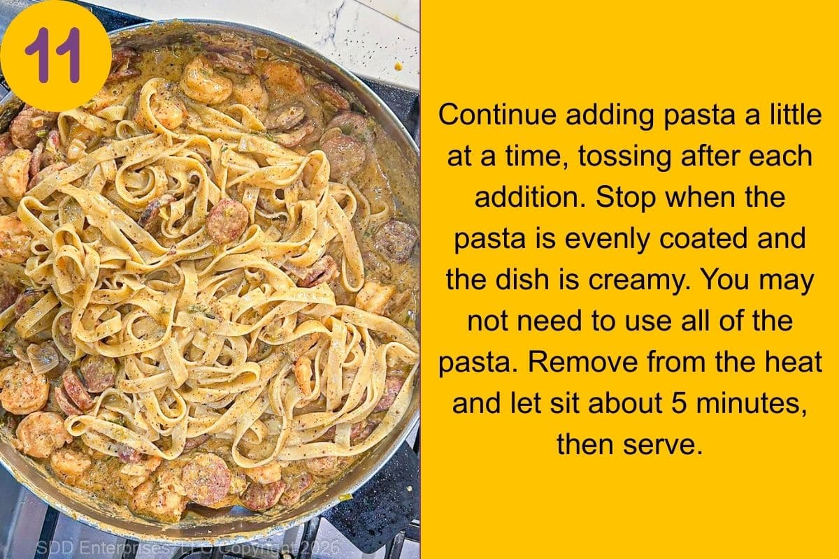 Creole Mustard Sauce mixed with sausage and shrimp in a skillet.