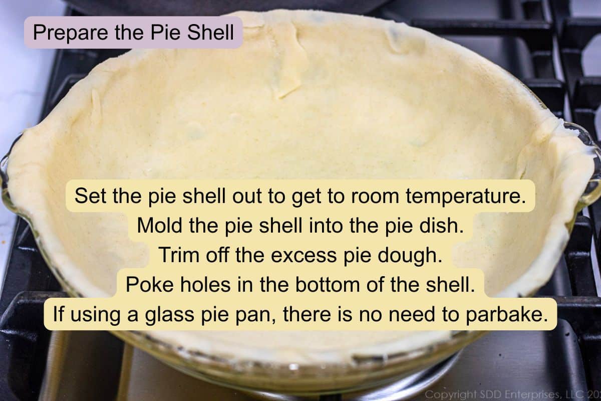 Prepared pie crust ready to be filled with crawfish filling.