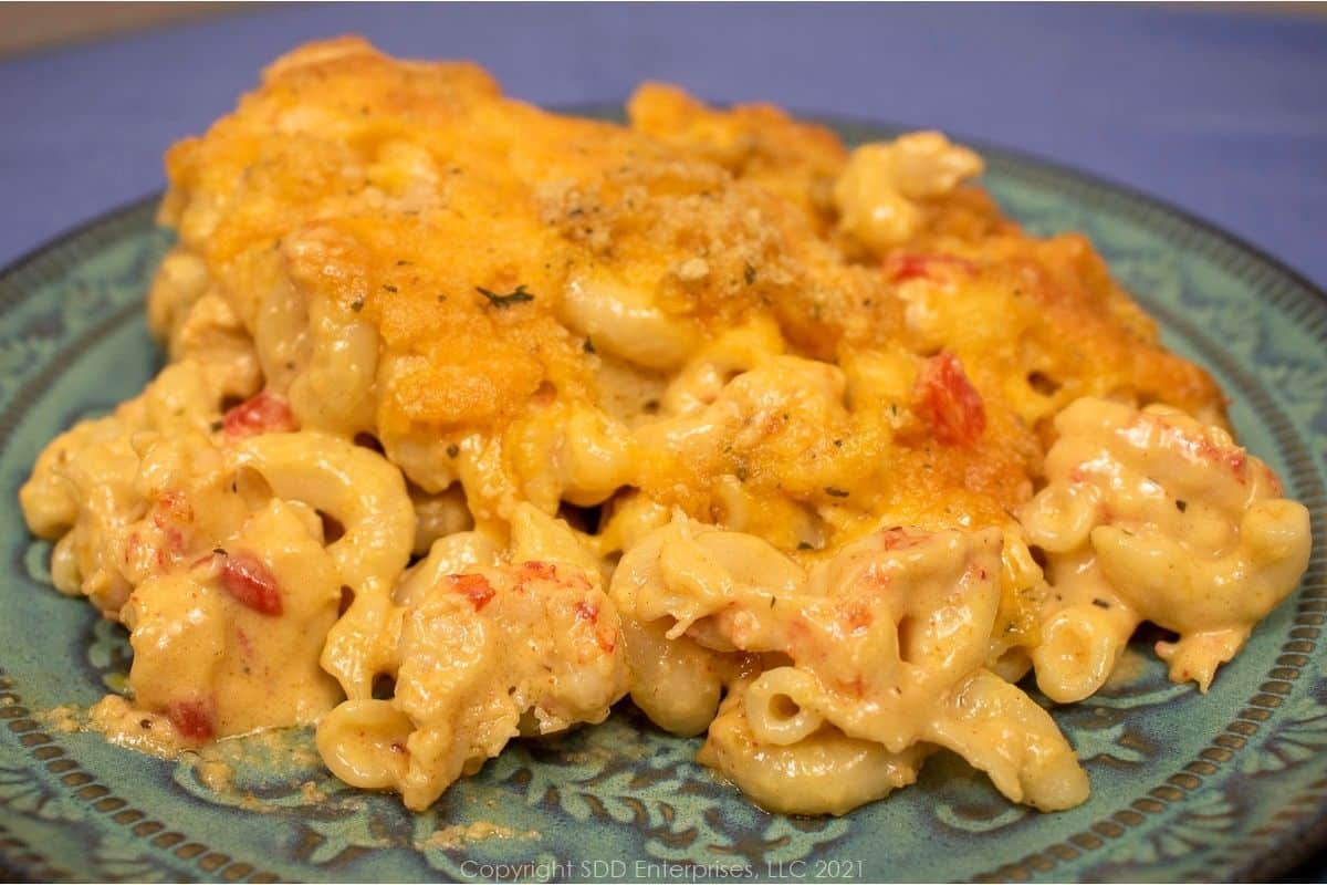 Creamy Cajun Crawfish Mac and Cheese baked golden brown in a casserole dish.