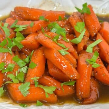 Cane Glazed Carrots garnished with parsley.