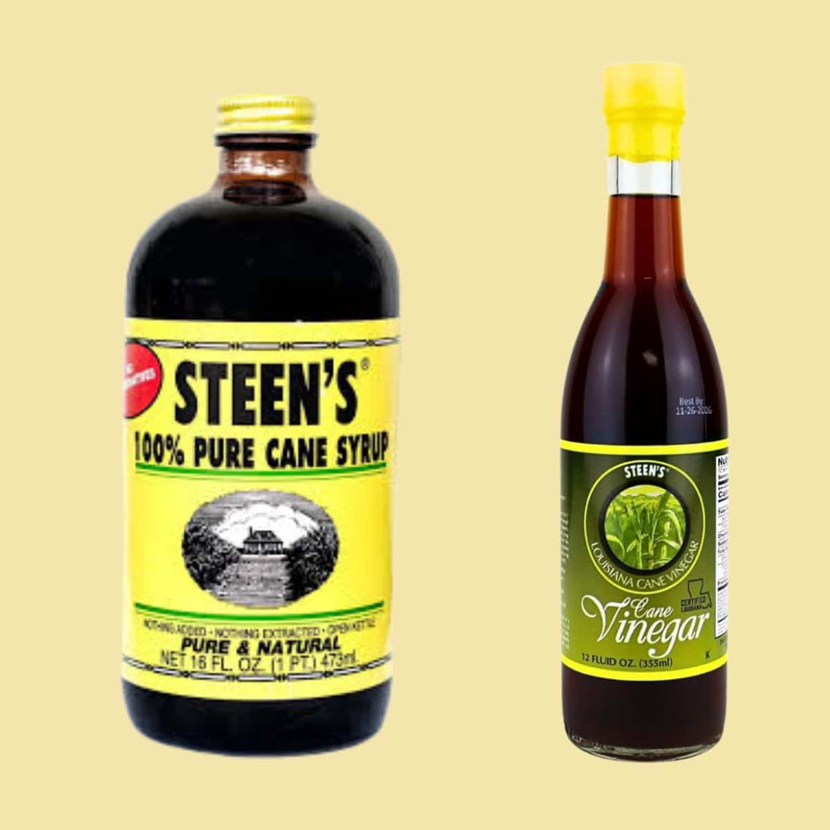 A bottle of Cane Syrup and a bottle of Cane Vinegar