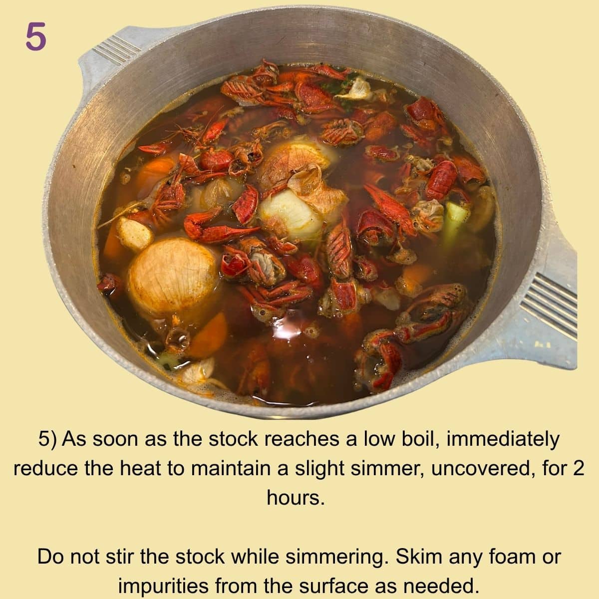 Crawfish stock simmering gently with shells, vegetables, and herbs.