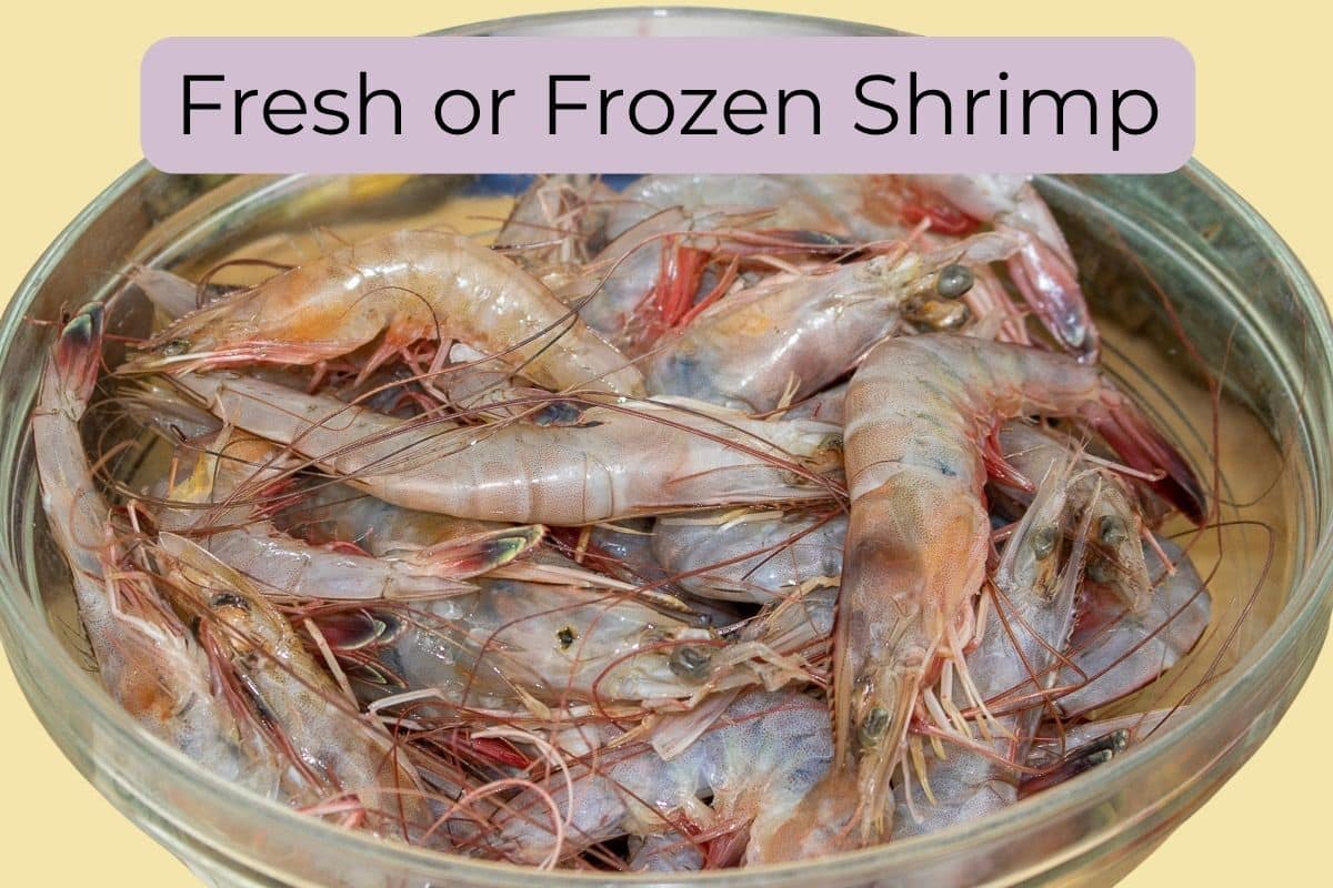 Raw shell-on shrimp in a glass bowl